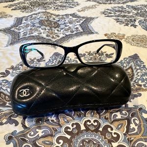 - Chanel 3189-A Eyeglasses Frames Clear Black frame